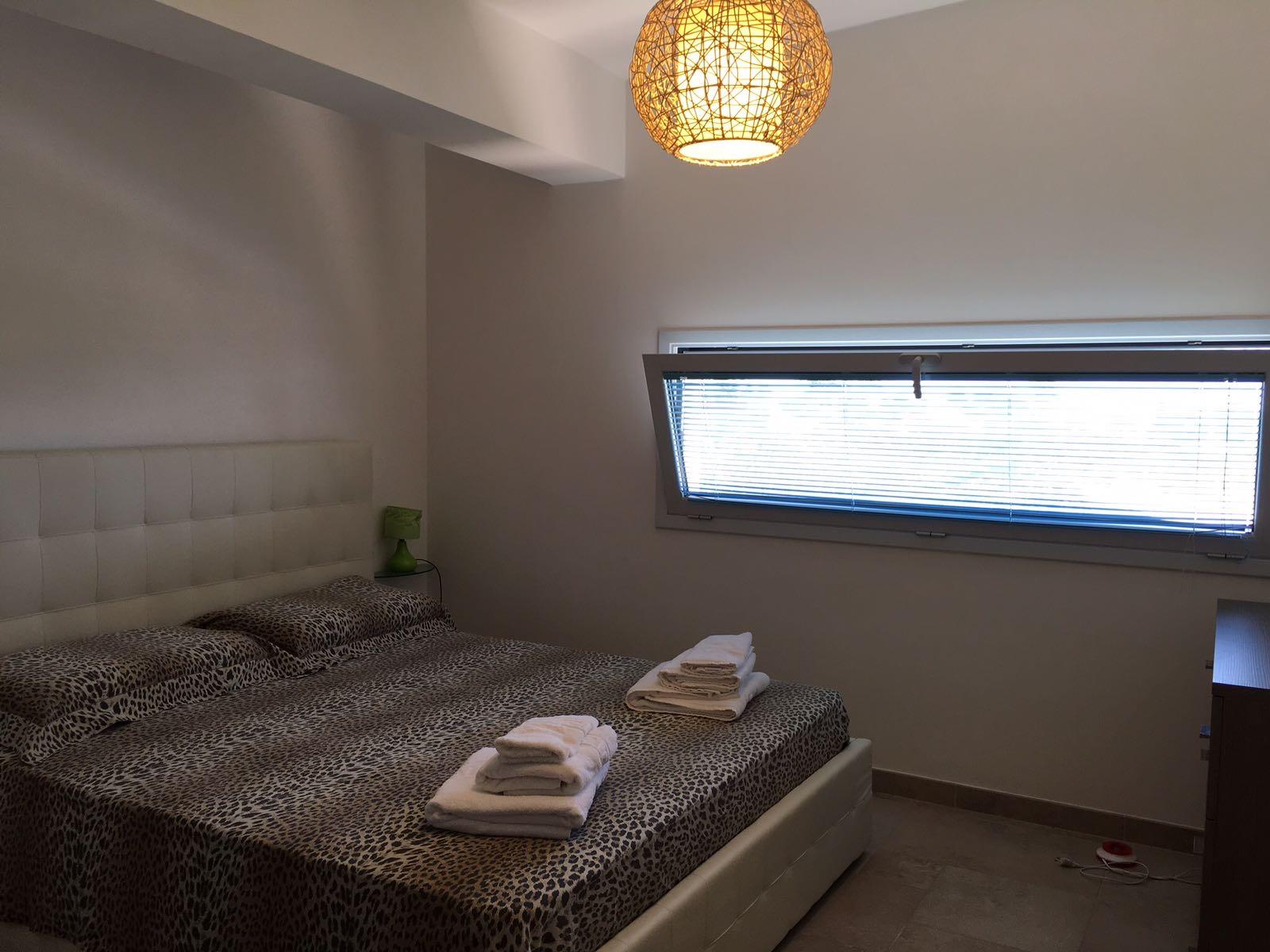 Camera Orchidea letto